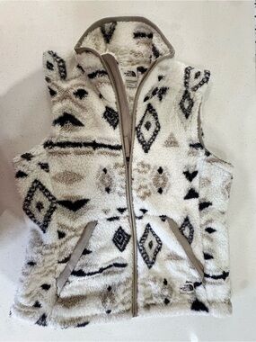 The North Face Cream Sherpa Vest with Black & Tan Pattern